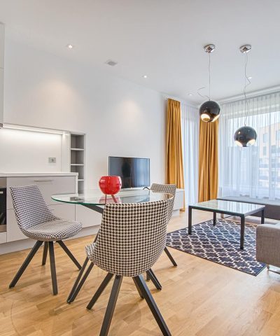 two-chairs-with-glass-table-on-living-room-near-window two-chairs-with-glass-table-on-living-room-near-window